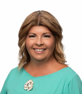 Portrait of Clare Merrick, REALTOR®.